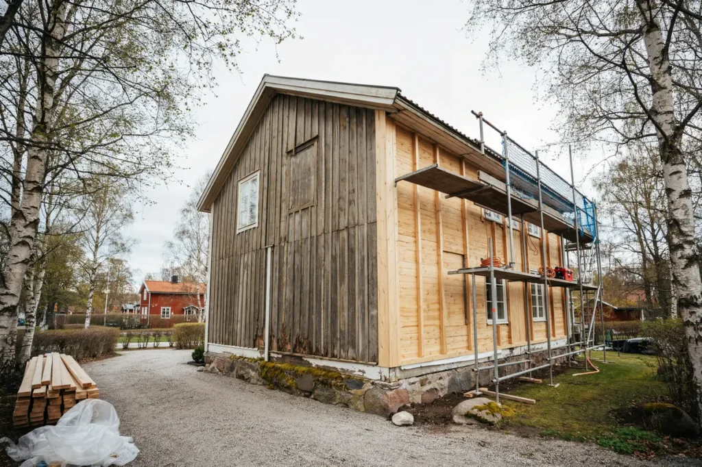 byta panel p huset tecken p r tskador r tt tr slag och smart v g till en h llbar fasad